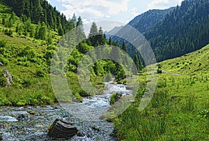 Stream flowing through zillertal alps of tirol austria