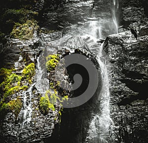 Stream of fresh water pouring down through the rocks in a tropical forest, natural beauty of the mother earth concept, Diyaluma