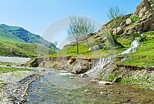 The stream meets the river