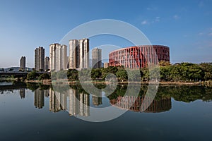 The stream reflects the Putian Museum of China in the evening