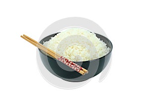 Stream rice in a bowl and chopsticks