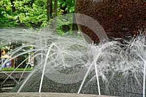 Stream of water from the granit fountain.