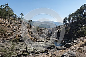Stream of water through the rocks below