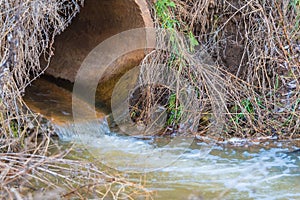 A stream of water running from a pipe