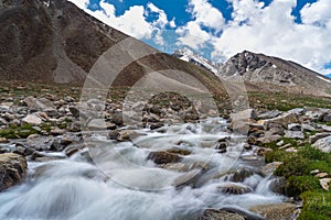 Stream water from snow mountains in Wari la high mountain pass in summer season, Himalaya mountains range in Leh, Ladakh region in