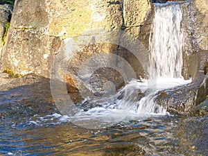 Stream and waterfall over rocks
