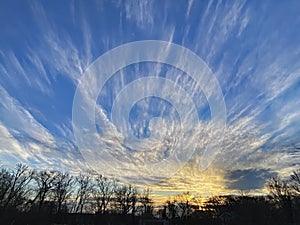 Streaming Clouds at Sunset in Winter