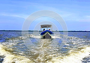 In the streamline of the boat in front