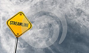 Streamline - yellow sign with cloudy sky