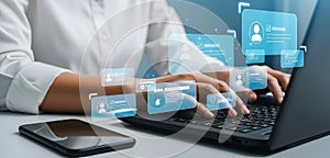 Business Professional Managing Digital User Profiles and Data on Laptop with Virtual Interface
