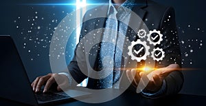 Business Technology Solution, Quality Management Process. Automation Gears in Hand, Dark Background with Copy Space.