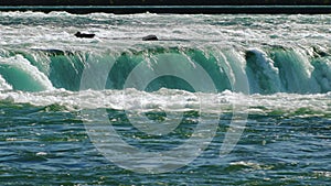 Streams of water of the mighty Niagara Falls