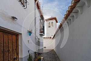 Street of the Albaicin neighborhood in the city of Granada, Andalusia, Spain photo