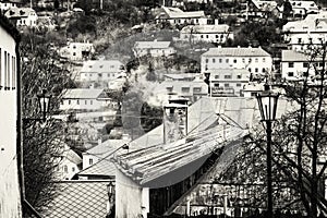 Street with ancient houses in the old town Banska Stiavnica, black and white