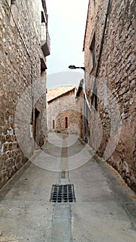 Street of an ancient town in the inland of Catalonia