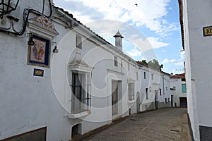 A street of the Andalusian magical town of CastaÃÂ±o del Robledo, Huelva, Spain photo