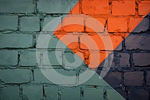 Street art detail. Green, orange and blue brick wall texture background. Geometric pattern, house wall. Creative, stylish backdrop