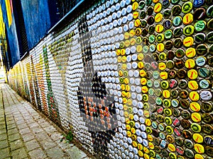 Street art  facade made of beer lids