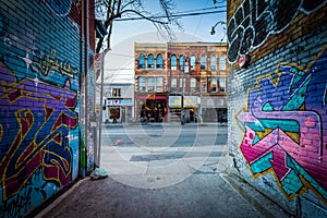 Street art in Graffiti Alley and buildings on Queen Street West, in the Fashion District of Toronto, Ontario.