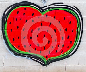 Street art graffiti of a heart-shaped sanctity