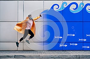 Street artist jumping to paint graffiti in underwater lifestyle.