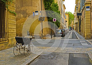 Street with Baby Carriage, Aix-en-Provence, France photo