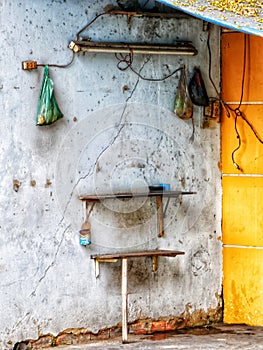 Street barbers shop on sidewalk in HCMC Vietnam