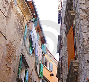 Street with beautiful old colorful buildings in small Adriatic coast city Rovinj, Croatia