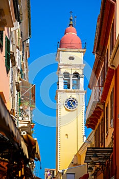 Street and the bell tower of the church of Saint Spyridon in Corfu, Greece