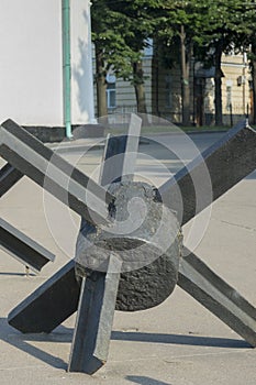 The street is blocked by anti-tank fences. The concept of war and confrontation. vertical photo. close up