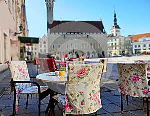 Street Cafe in the city Empty tables and chair waiting People Relax and cup of coffee travel to Europe Baltic state Old Town Of Ta