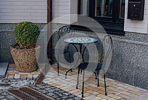 Street cafe table and chairs