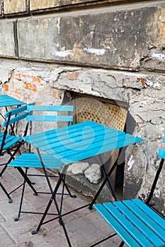 Street cafe table and chairs at Kazimierz district Jewish quarter in Krakow, Poland