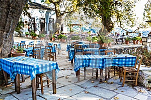 Street and cafe view at Makrinitsa village of Pelion, Greece