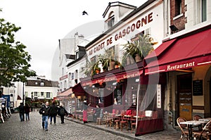 A street and cafes in Montmartre.