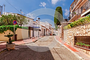 Street of Calella de Palafrugell, Catalonia, Spain near of Barcelona. Scenic fisherman village with nice sand beach and clear blue photo