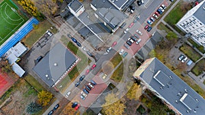 Street with cars top aerial city view from drone