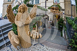 Street Christmas Nativity scene made of straw, Prague, Czech Republic