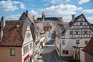 Street with church in Rothenburg ob der Tauber, Germany