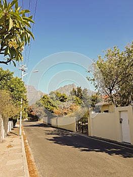 Street in Claremont, Cape Town, South Africa. Sunny weather