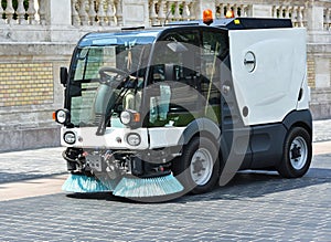 Street cleaner vehicle at work