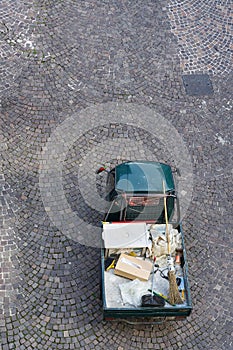 Street cleaning vehicle in the old town of Malcesine in Italy