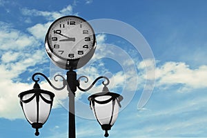 street clock with blue sky