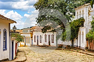 Street with cobblestones and some houses with colonial architecture