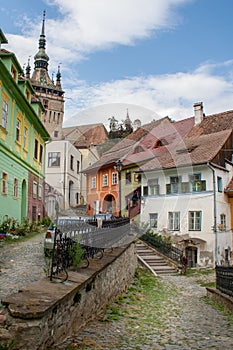 Street with colored houses in Sighisoara, Romania