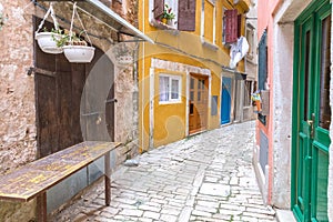 Street with colorful facade of an old houses in Rovinj, Croatia,