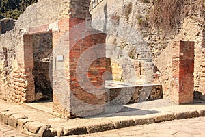 Street corner and tavern. Herculaneum. Naples. Italy