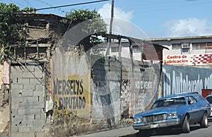 Street in Cumana city with old car