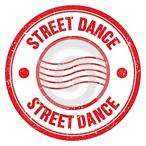 STREET DANCE text written on red round postal stamp sign