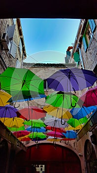 Street decorated with colored umbrellas.Split, Croatia